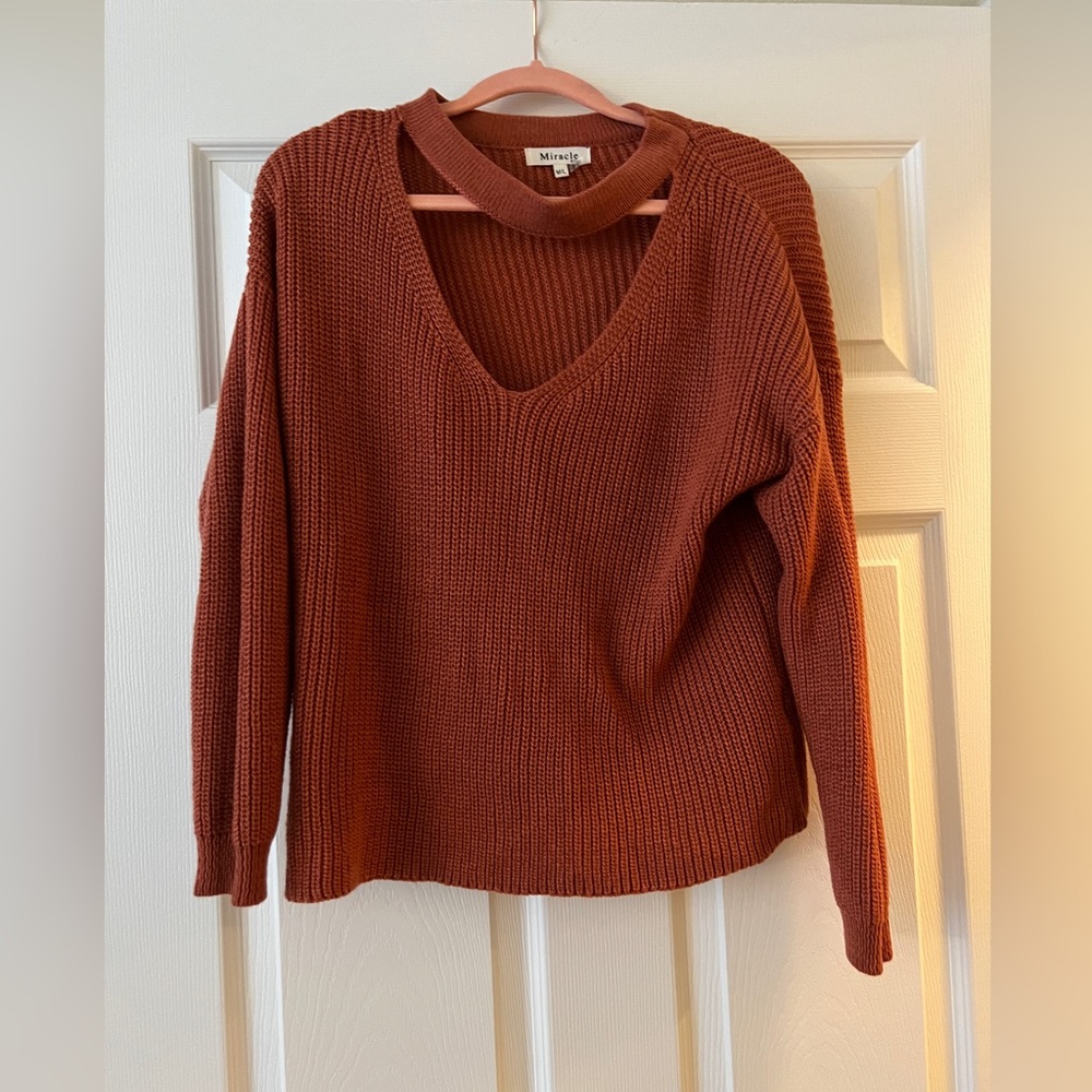 Orange cut out sweater